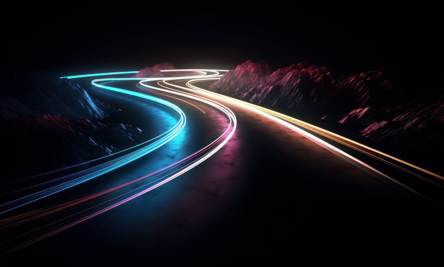 Blue, pink and yellow neon lit lines outline a windy road